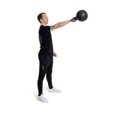 male model exercising with the Adjustable Kettlebell