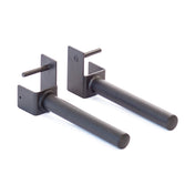 The Pin Plate Pegs by Bells of Steel, featuring a black steel cylindrical design with bracket attachment, are ideal for any power rack. Each peg comes with a pin for secure attachment to gym equipment and is showcased against a white background.