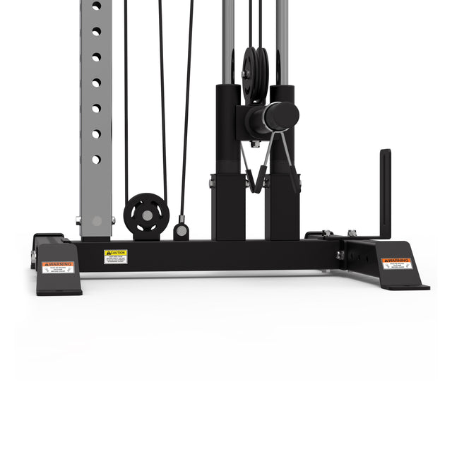 The Bells of Steel Cable Tower is a black and gray gym cable crossover machine with pulleys, cables, and a weight stack. It’s perfect for home gyms, includes warning labels, and stands against a white background for versatile cable machine exercises.