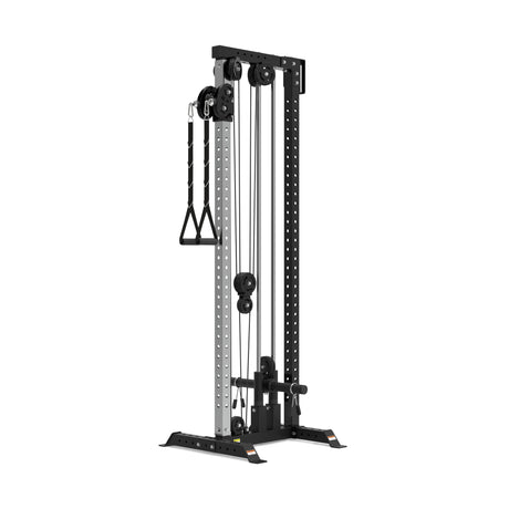 The Bells of Steel Cable Tower, in black and silver, is shown against a plain white background. It features adjustable pulleys, a weight stack, and a single handle attachment for strength training exercises.