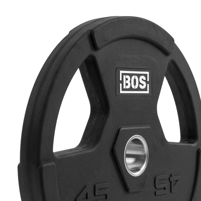 A close-up image of a Bells of Steel Canada Rubber Coated Iron Weight Plate, showcasing ergonomic handles and engraved with "BOS" and "45 LB." The central hole is designed to fit onto a barbell.