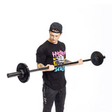 male athlete using the Short Rackable Barbell for bicep curls