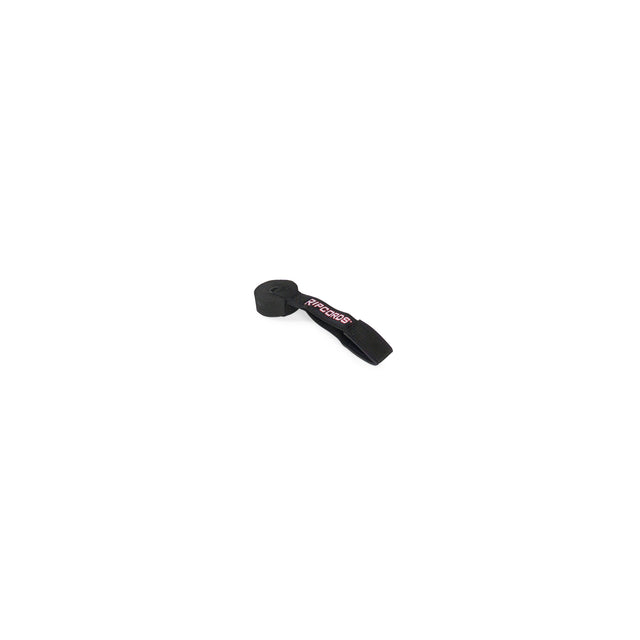A black Human Trainer - Ripcords strap from Bells of Steel, featuring “PROGRIP” in red and white lettering, is rolled up with a Velcro closure against a plain white background—perfect for use with resistance bands or as a secure door anchor during workouts.
