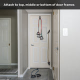 Bells of Steel Human Trainer – Ripcords exercise resistance bands with rubber grip handles are attached at the top, middle, and bottom of a white door, demonstrating the various possible workout positions. Text at the top reads: “Attach to top, middle or bottom of door frames.”.