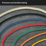 Six different colored tubes (white, black, blue, red, green, orange) are arranged in curved lines on a gray surface. The text “Premium and durable tubing” appears at the top of the image, highlighting the Bells of Steel Human Trainer - Ripcords—premium resistance bands designed for versatile workouts.