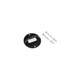 A round black wall mount bracket from the Human Trainer - Ripcords line by Bells of Steel, featuring a white adhesive strip and designed to serve as a sturdy door anchor for resistance bands, is displayed alongside two silver screws and washers on a white background.