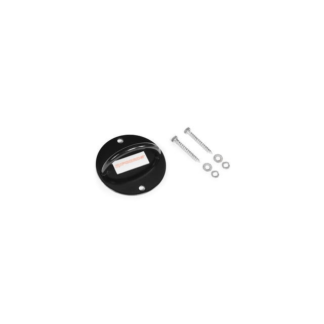 A round black wall mount bracket from the Human Trainer - Ripcords line by Bells of Steel, featuring a white adhesive strip and designed to serve as a sturdy door anchor for resistance bands, is displayed alongside two silver screws and washers on a white background.
