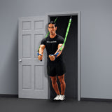 A person uses Bells of Steel Human Trainer - Ceiling Mounts attached to an anchor point for a workout, standing with arms extended forward and feet together, wearing a black “BELLS OF STEEL” shirt and shorts.