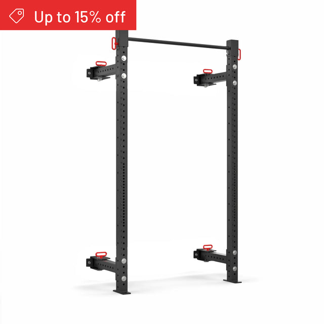 The Bells of Steel Roc Foldable 2 Post Cage Builder (3" x 3", ⅝" holes) is a black metal power rack with adjustable bar holders and modular parts, shown on white. A red "Up to 15% off" banner appears in the top left—ideal for any home gym.