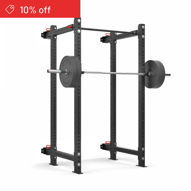 The Bells of Steel Roc Foldable 4 Post Cage Builder (3" x 3", ⅝" holes) is shown loaded with a barbell and weight plates on a white background. A red banner at the top left highlights "10% off." Perfect for any home gym.