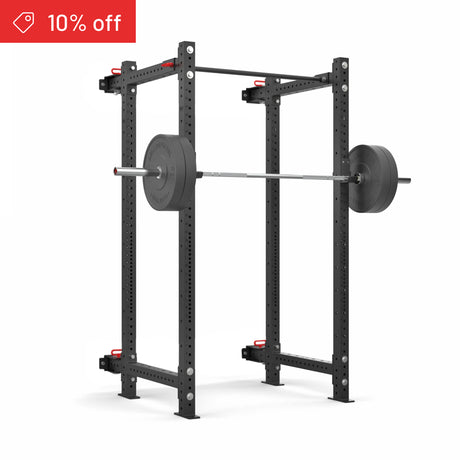 The Bells of Steel Roc Foldable 4 Post Cage Builder (3" x 3", ⅝" Holes) in black, shown with a loaded barbell on adjustable hooks, features a red “10% off” tag in the top left on a plain white background—ideal for any home gym.