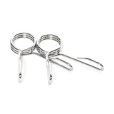 Two Bells of Steel Spring Collars, metal Olympic barbell collars for securing weights, are shown side by side on a white background.