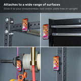 Four images feature the Bells of Steel Selfie Sentinel - Magnetic Rack Phone Holder with an orange-cased phone attached to various metal surfaces—a squat rack, a tool chest, a plate tree, and an upright support—highlighting its versatility in the gym. The MagSafe-compatible magnetic design ensures your device remains securely in place throughout any workout.