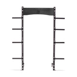 The Hydra Rack Plate Extension by Bells of Steel is constructed from black metal and includes a series of evenly spaced holes for adjustable barbell placements. Each side features six horizontal pegs, offering ample weight storage, while a branded plate on the top crossbar elegantly stands out against the white background.