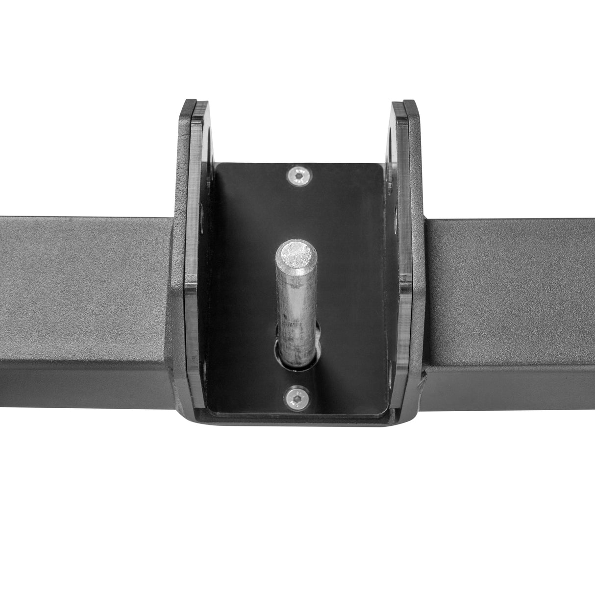 A close-up of the Bells of Steel Shoulder Boulder/Chest Fly Attachment, featuring a black metal bracket with a central cylindrical pin mounted on a flat surface, designed for space-saving in mechanical or industrial setups.