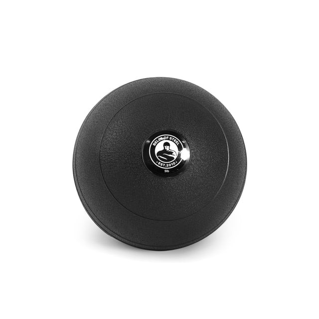 Image of a black round "Bells of Steel" Slam Ball with a central metal disc engraved with text and a logo, featuring a stylized figure lifting weights. Perfect for explosive power in your cardio workouts, the slam ball has a textured surface finish.