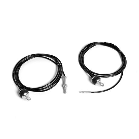 Two coiled, black 84" Hydra/Manticore Lat Pulldown Attachment Cables from Bells of Steel, featuring metal connectors on each end, are placed separately on a plain white background. They are neatly arranged to showcase both the coiled sections and connectors.