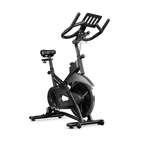 The Bells of Steel Blitz Indoor Cycling Bike is a black stationary bike with magnetic resistance, adjustable seat and handlebars, and a small display screen, shown on a white background.