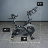 The Bells of Steel Blitz Indoor Cycling Bike is shown indoors, measuring 21.5"W x 44"L x 53"H. It features adjustable handlebars and magnetic resistance, placed on a tiled floor against a gray wall.