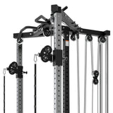 Close-up of the Bells of Steel All-in-One Trainer in a home gym, showcasing adjustable pulleys, various attachments like handles and weights, a sturdy steel frame, and multiple cables for diverse workouts—ideal for comprehensive fitness routines.