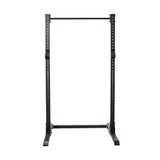 The Bells of Steel Hydra Squat Stand - Prebuilt features a free-standing, black steel design perfect for home gyms. It offers modular components and adjustable ⅝" holes for barbell placement, sturdy foot supports, and stands elegantly against a plain white background.