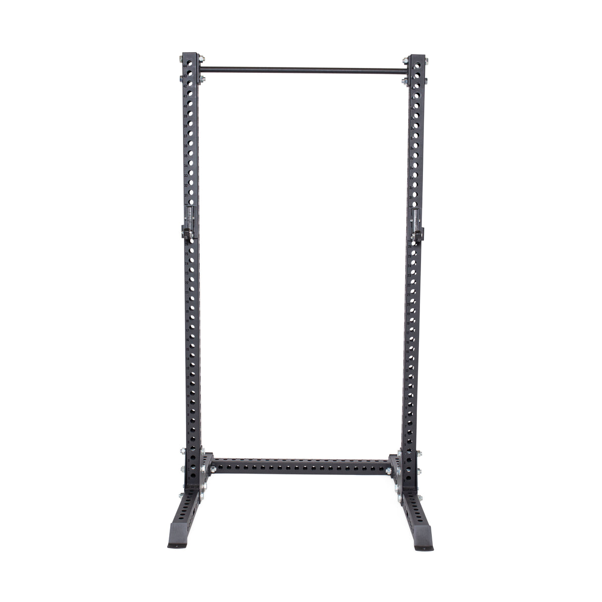 The Manticore Squat Stand by Bells of Steel is a black power rack with a 1,000-pound capacity and adjustable 1" holes. It's designed for weightlifting with a sturdy 3" x 3" frame, pull-up bar, and wide base for stability.