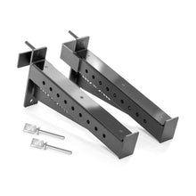 The Bells of Steel Spotter Arms Rack Attachment, featuring black heavy-duty metal, multiple holes, angled ends, and two labeled pins, are shown on a white background for secure and reliable barbell safety.