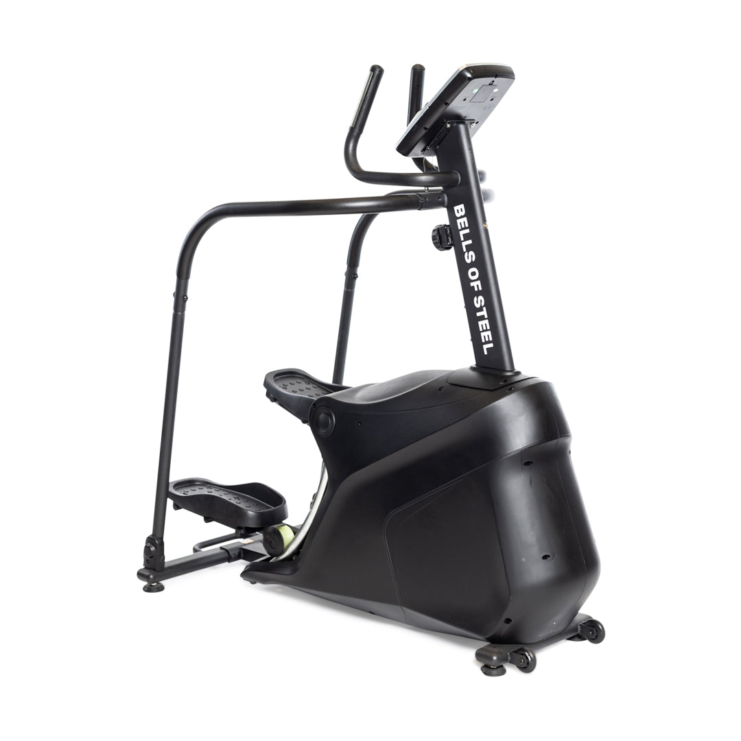 A Blitz Stepper by Bells of Steel in black boasts a large fan at the front, dual handlebars, and a digital display for joint-friendly cardio. With its sturdy pedals and sleek frame, it is perfect for intense workouts.