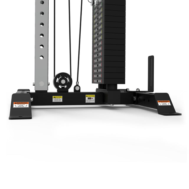 The Bells of Steel Cable Tower is perfect for home gyms, featuring a sturdy metal frame, black weight plates, pulleys, and cables. Warning labels on the base make it ideal for various cable machine exercises.