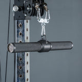 A close-up of the Bells of Steel Fat Bar - Straight Handle Bar attached to a cable machine for weightlifting, shown against a gray background.