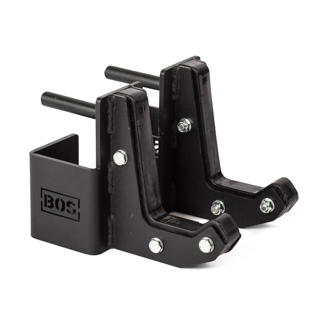 Introducing the Sandwich J-Cups: a pair of robust, black metal weight plate holders with the Bells of Steel logo elegantly showcased on the side. Now enhanced with HDPE padding, each holder boasts a bracket design complete with bolts for secure attachment to gym equipment frames, providing optimal protection for both your plates and rack during storage.