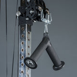 Close-up of the Bells of Steel Fat Bar - Tricep Pressdown with two black grip handles, attached to an adjustable steel frame with numbered holes—perfect for fat bar tricep exercises and improving grip strength.