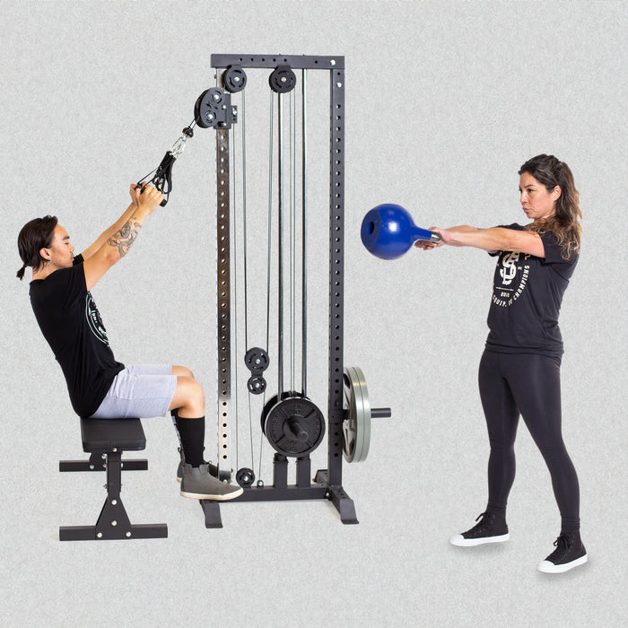 male model using plate loaded cable tower and female model doing kettlebell swing