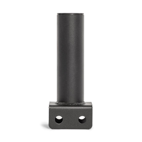 The Hydra Vertical Bar Holder for Flat Foot by Bells of Steel is a black metal cylindrical adapter with a mounting plate that has two holes at the base, making it ideal for power rack setups in automotive or mechanical applications. Its smooth, matte finish indicates durability and functionality while improving home gym organization.