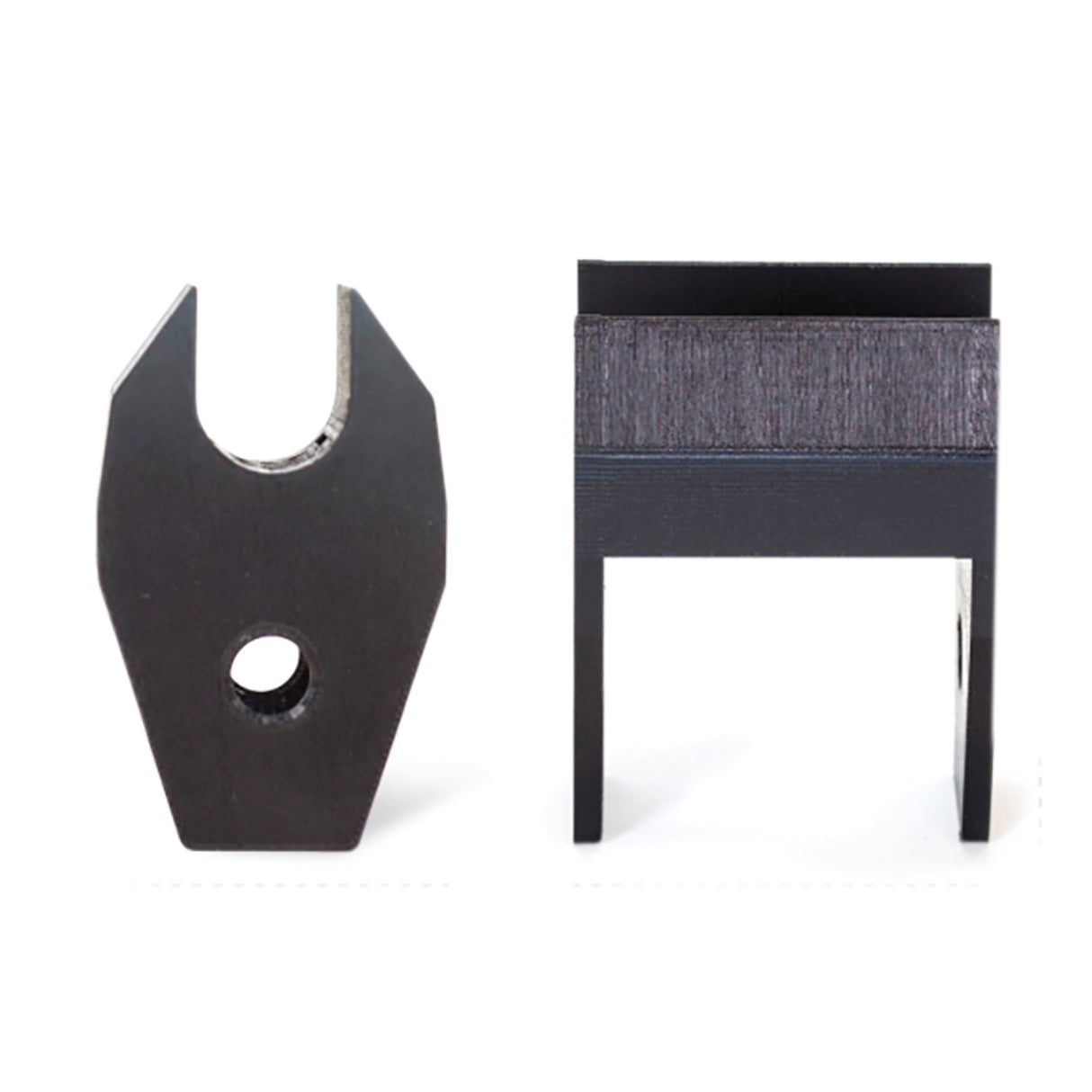 The Bells of Steel Above Rack Barbell Holder features two black metal components—one with a U-shaped notch and hole (front view), and the other with a rectangular top and dual legs (side view)—ideal for securely storing your barbell on your power rack.