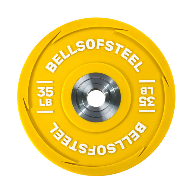 The durable Bells of Steel yellow urethane bumper plate, labeled "35 LB" on both sides, includes a silver center ideal for Olympic weightlifting and easy barbell loading.