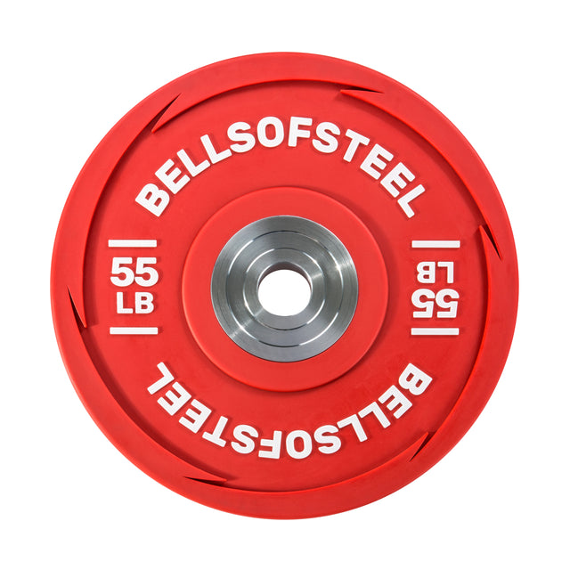 The Urethane Bumper Plates by Bells of Steel are ideal for Olympic weightlifting, featuring "55 LB" in white text on both sides and the brand name around the central metal insert. The red plate has grooved detailing on the outer edge for increased durability and a sleek design.