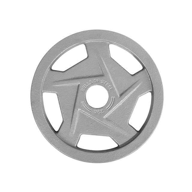 The Gray Mighty Grip Olympic Weight Plate by Bells of Steel is a silver steel weight plate with an ergonomic design and a star-shaped pattern. It features "Bells of Steel" engraved on its surface and is coated in durable hammertone powder coat. The plate includes five triangular cutouts evenly spaced around the perimeter for an enhanced Olympic lifting experience.