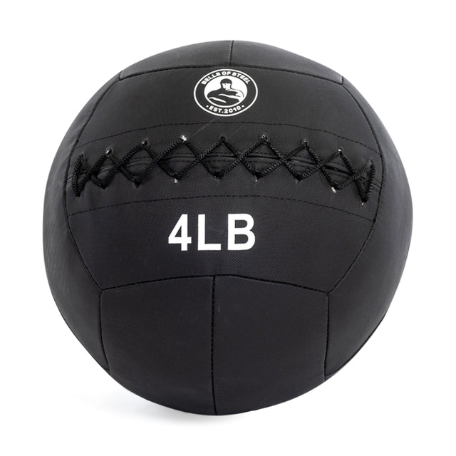 A black 4-pound medicine ball from Bells of Steel is displayed, featuring triple stitching with a circular logo at the top. Perfect for your workout du jour.