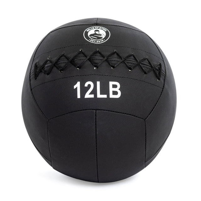 The 12-pound black Triple Stitched Medicine Ball by Bells of Steel has crisp white weight text, stitched detailing on top, and a durable Kevlar outer shell, perfect for diverse workouts.