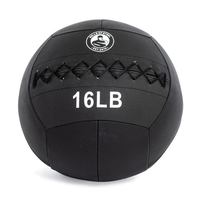 The Bells of Steel Triple Stitched Medicine Ball, perfect for your workout, is a 16-pound black ball featuring a zig-zag stitch and barbell logo. Its Kevlar outer shell ensures durability against the smooth surface.