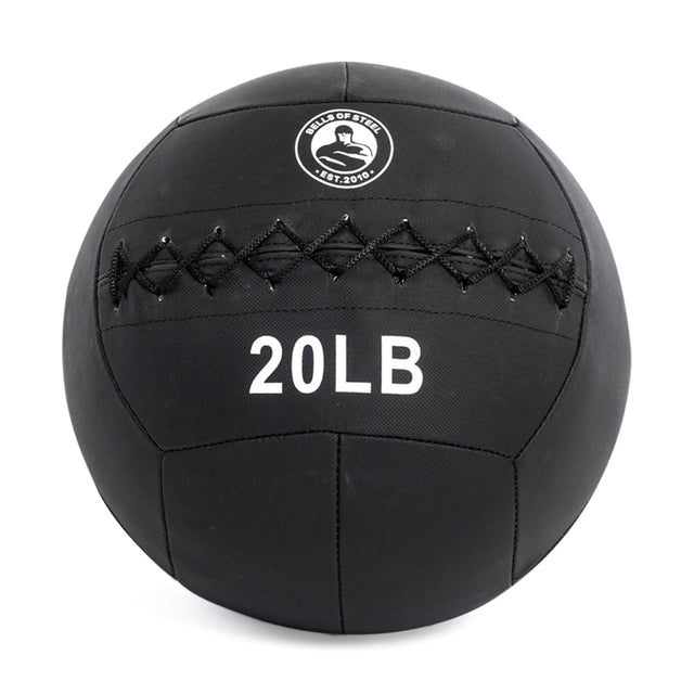 The Bells of Steel Triple Stitched Medicine Ball is black with a top logo and "20 LB" marking, featuring reinforced zigzag stitching and a durable Kevlar outer shell, perfect for your workout needs.