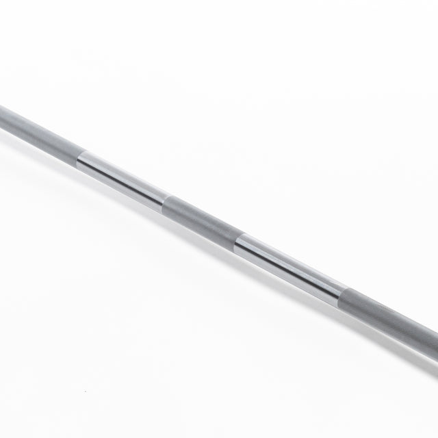 The Oly Lifting Needle Bearing Bar - Women's by Bells of Steel features sleek metallic segments in alternating smooth silver and matte gray, reminiscent of the best Olympic weightlifting bars for women, set against a plain white background.