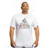 A man confidently stands against a plain white background, showcasing style in a buttery soft Bamboo T-Shirt from Bells of Steel, featuring a colorful geometric design and the text "HYDRA SERIES.