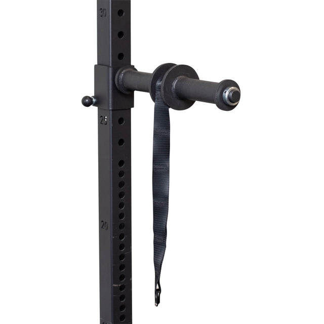 Close-up of the Bells of Steel Wrist Roller and Rack Attachment, showcasing a black rod with a strap. It includes numbered adjustment holes on its vertical frame for customizable height, making it perfect for enhancing grip strength and workout versatility.