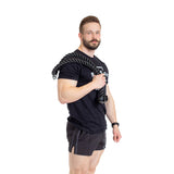 A man in a black t-shirt and shorts holds the Bells of Steel Extra Long Tricep Rope Extension (137cm) draped over his shoulder against a white background.