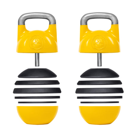 The Bells of Steel Adjustable Competition Kettlebells, featuring yellow color and sturdy metal handles, showcase a modular design with stackable iron weight plates in a spherical shape, highlighting their versatility for workouts.