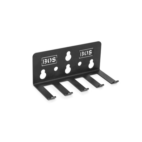 The Bells of Steel Accessory Holder (Wall or Rack Mounted) features four prongs for hanging gear, five keyhole slots for mounting, and "BOS" cutouts—perfect for organizing gym accessories or barbell collars.