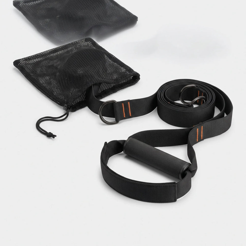 The Human Trainer — a bodyweight gym in a mesh bag