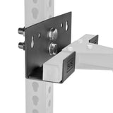 Close-up of the Bells of Steel Wall or Rack Mounted Bench Hanger bolted to a post with evenly spaced holes. The bracket supports a horizontal arm with a BOS rubber end cap; hardware and connections are clearly visible.